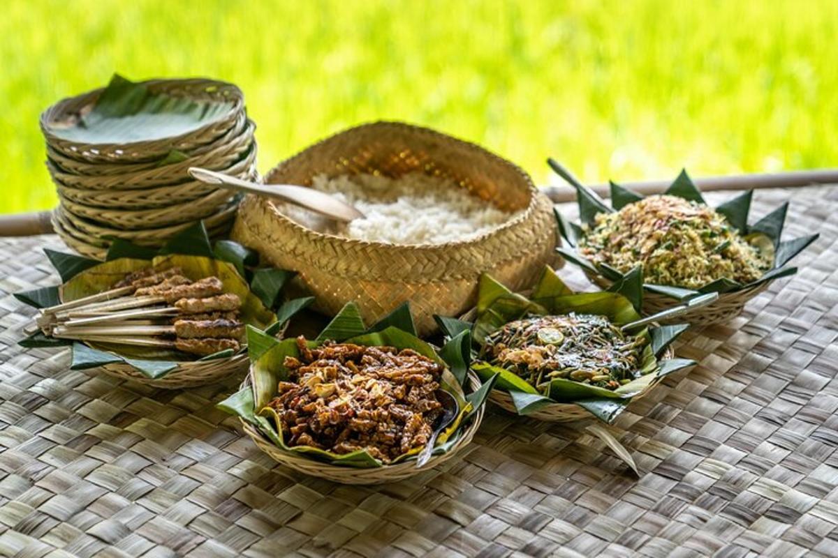 a table topped with bowls of food and rice
