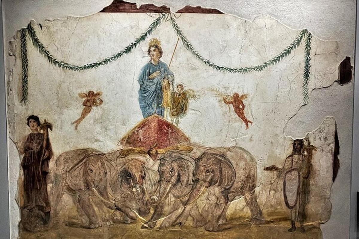 una pintura d'un home muntat en un elefant