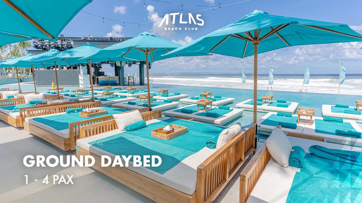 a rendering of a pool with blue chairs and umbrellas