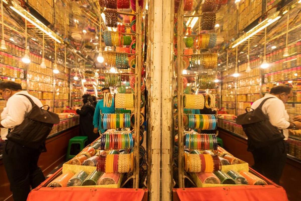 a store with people working in a market with baskets
