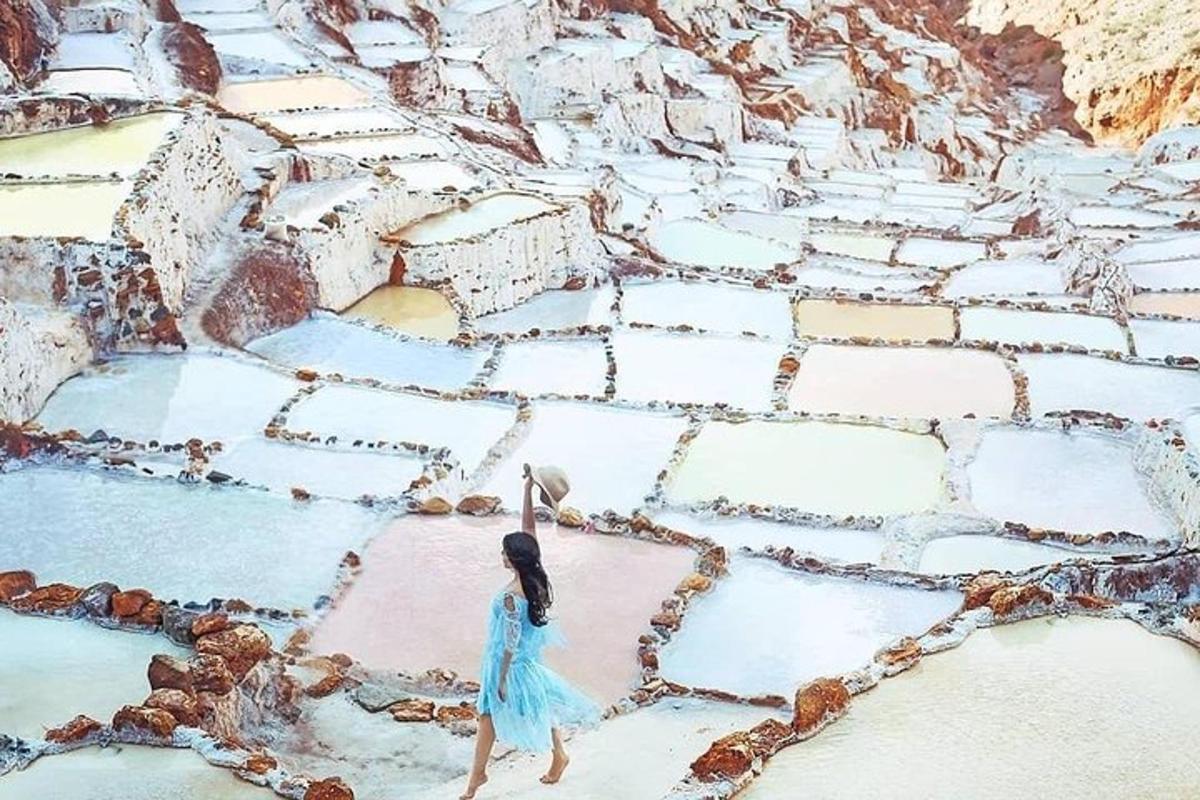 a woman walking on a stone walkway