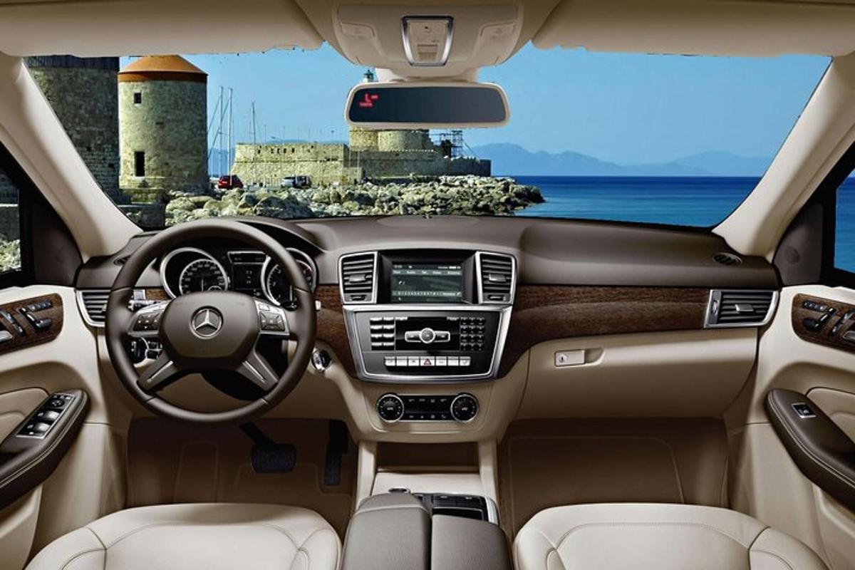 a view of the dashboard of a car with a lighthouse