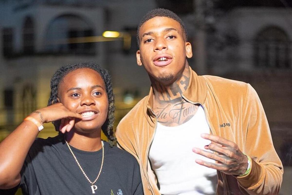 a man and a woman posing for a picture