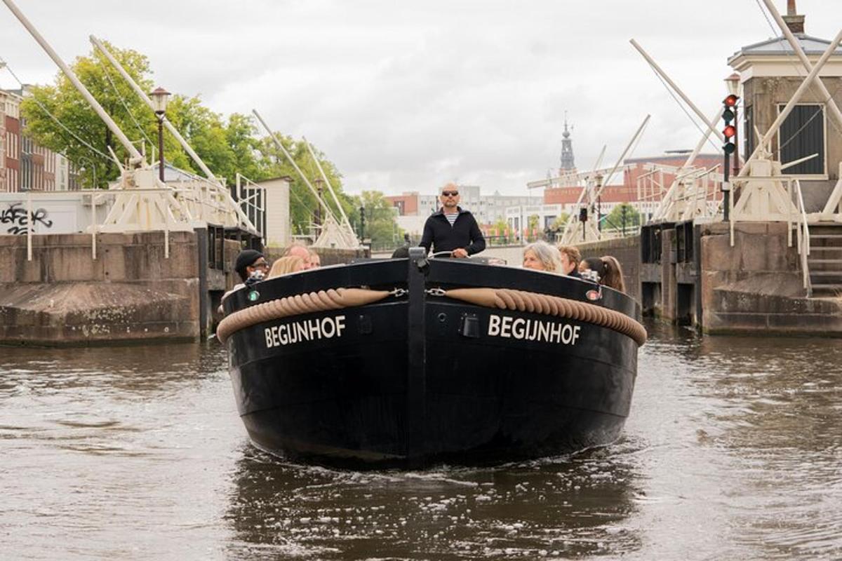 a group of people riding in a boat in the water