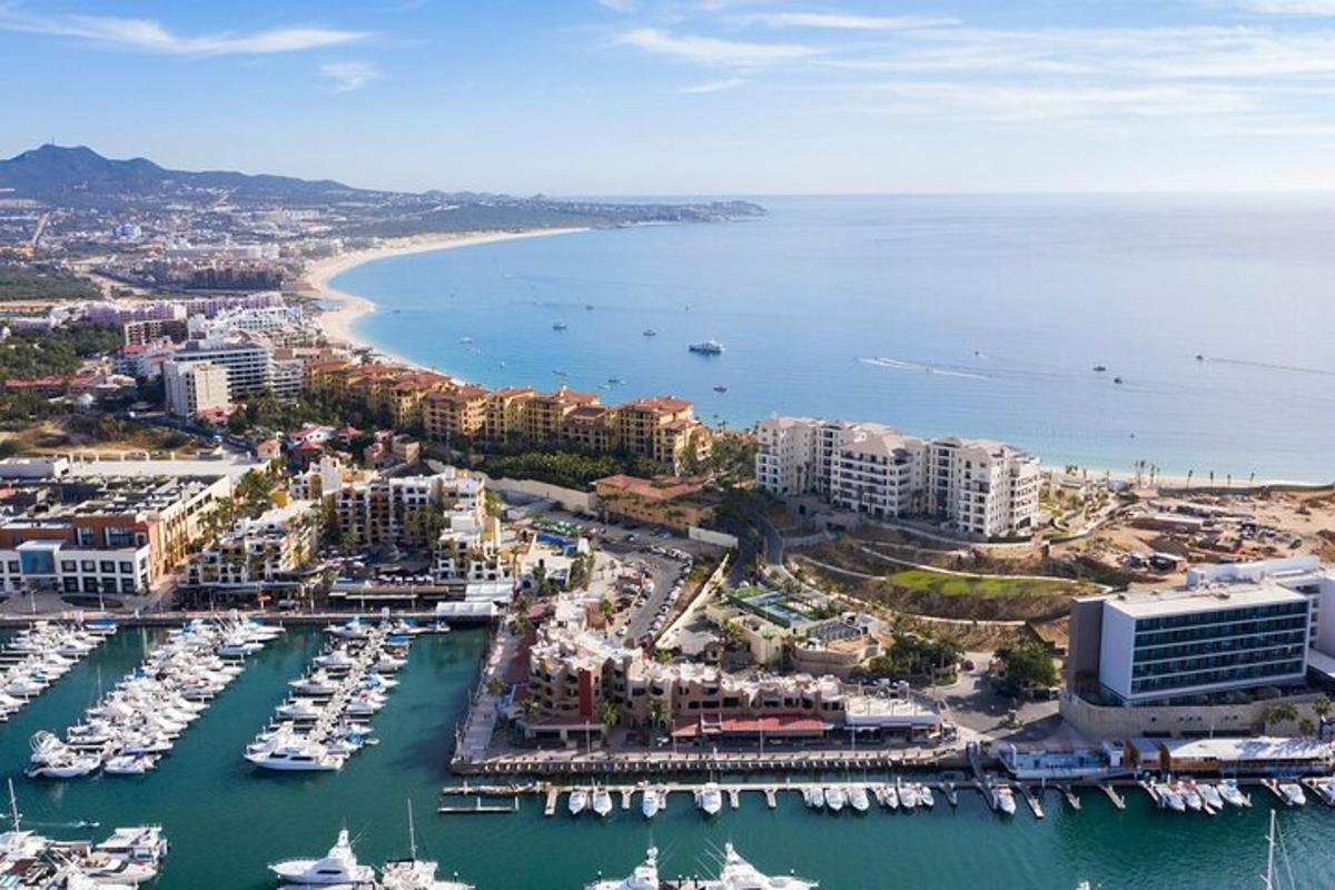 an aerial view of a harbor with boats in the water