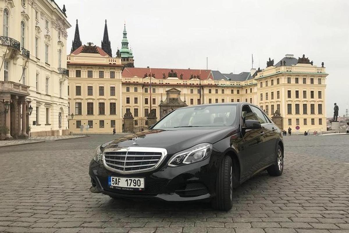 a black car parked in front of a building