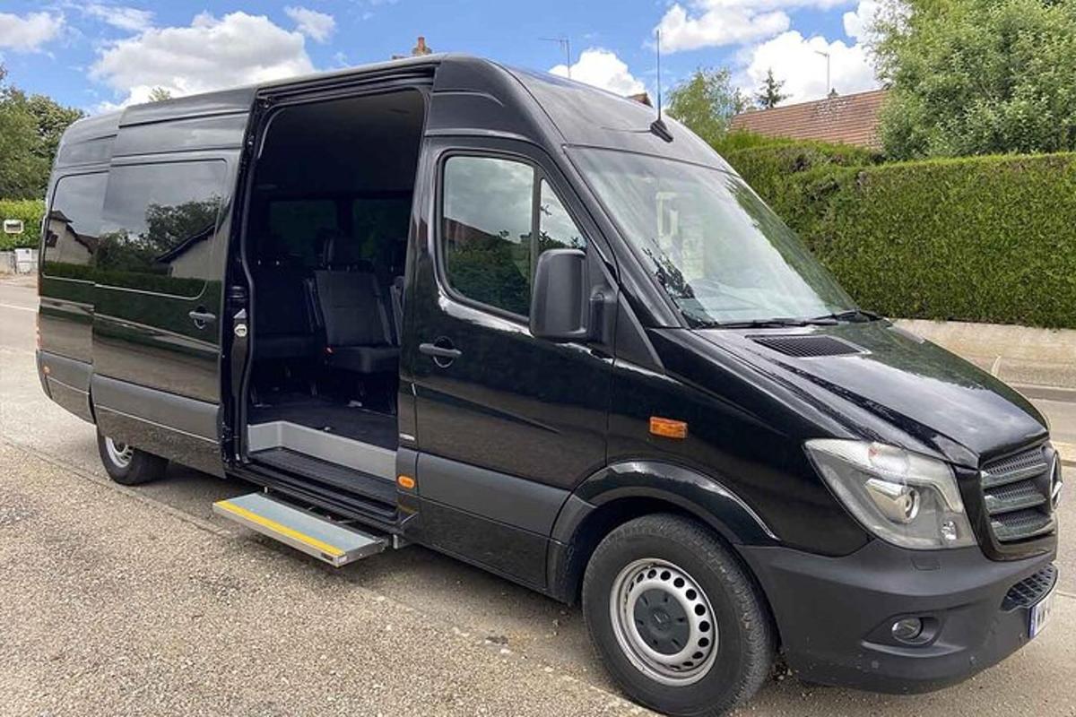 a black van parked in a parking lot