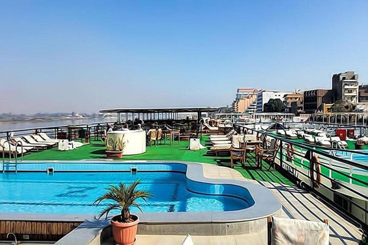 a swimming pool on top of a cruise ship