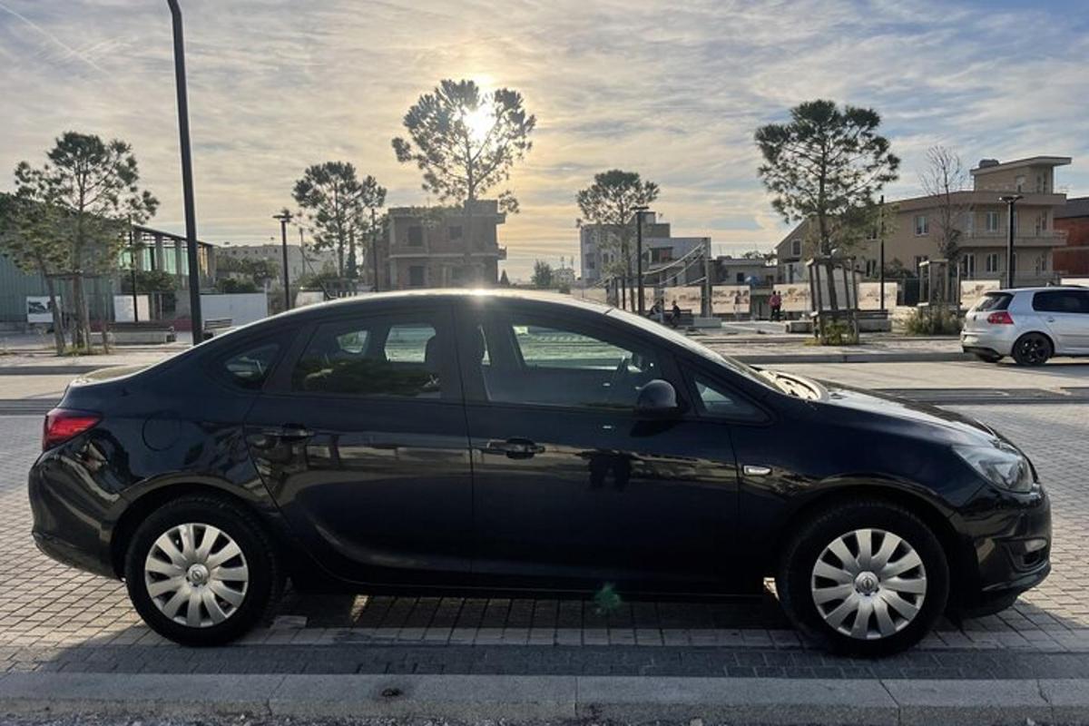 a black car parked in a parking lot
