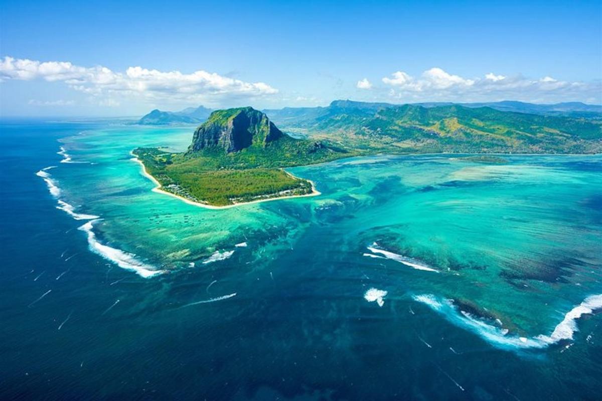 an aerial view of an island in the ocean