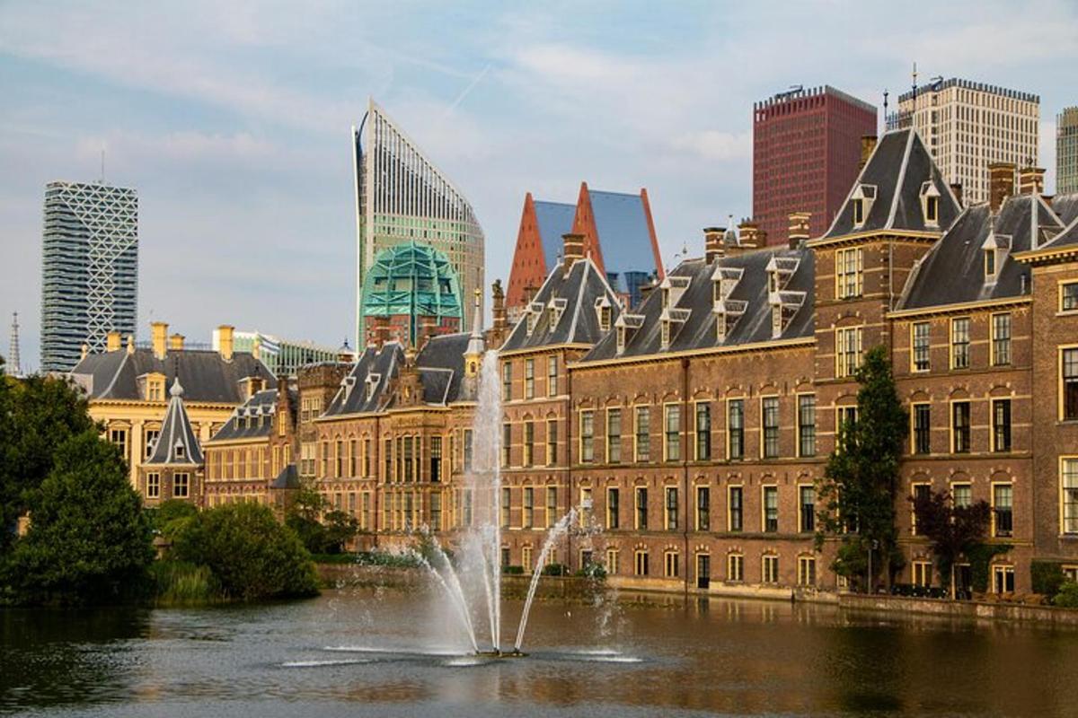 a fountain in the middle of a city with buildings