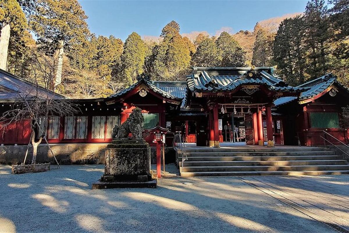 a temple with a statue in front of a building