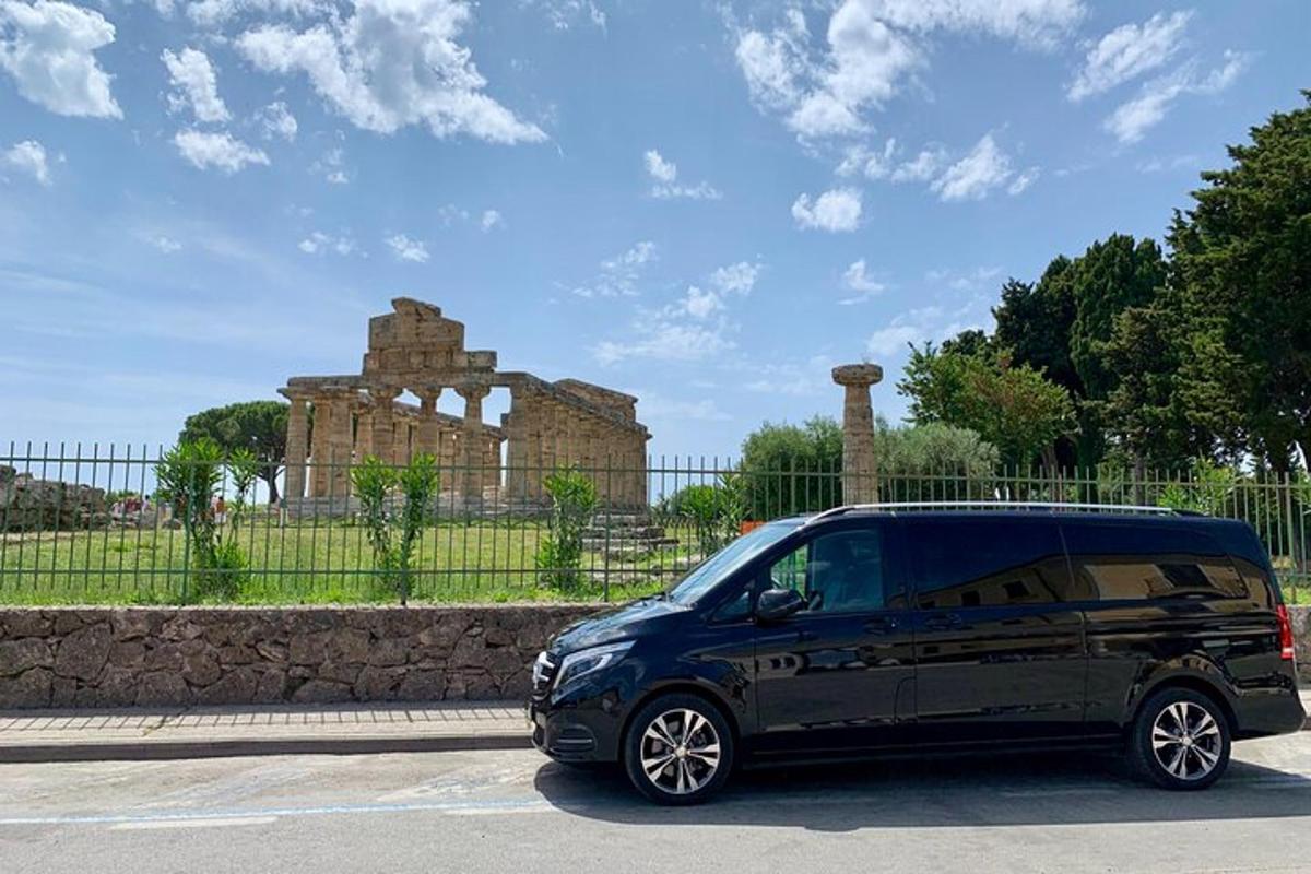 a black van parked in front of a building