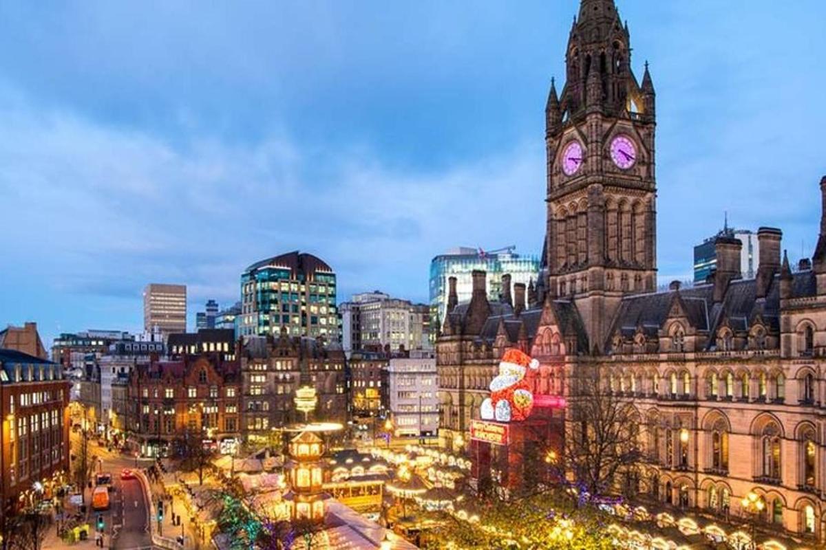 a city with a clock tower and a building with a clock