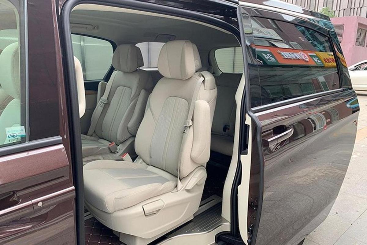 an open back of a minivan with the doors open