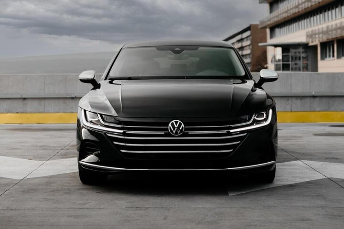 a black car parked in a parking lot