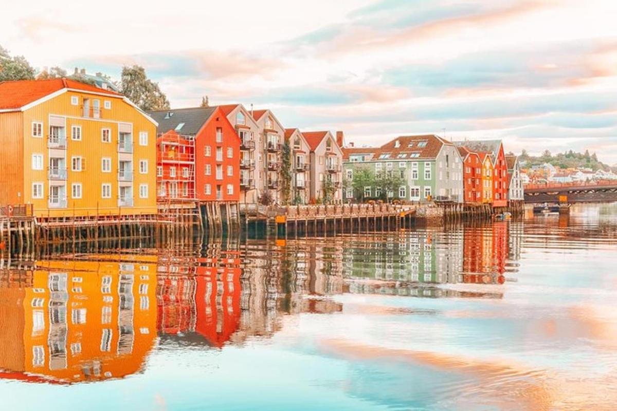 a row of colorful buildings next to a body of water