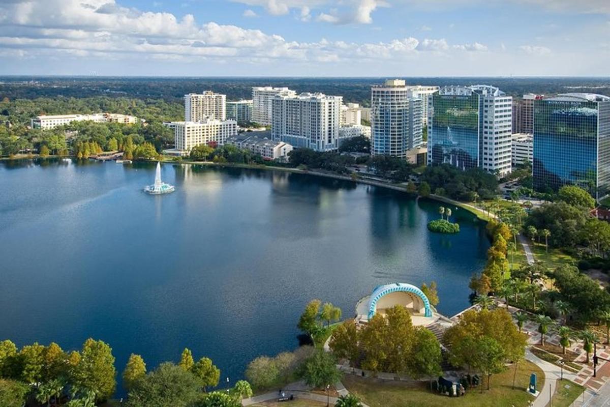 an aerial view of a large lake in a city