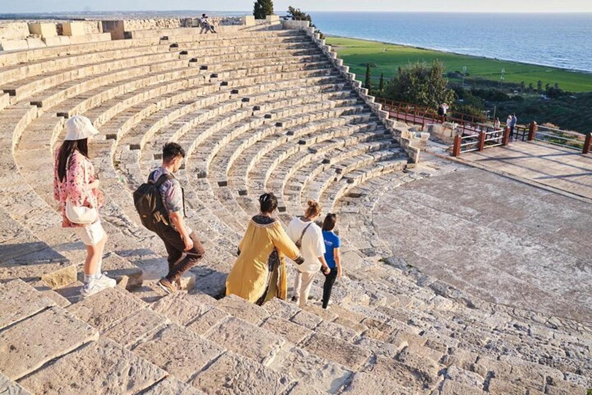 a group of people standing in an amphitheater