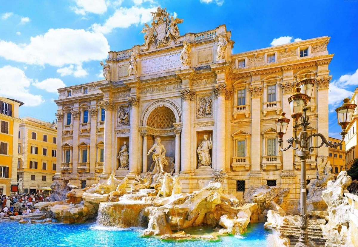 a building with a fountain in front of a building