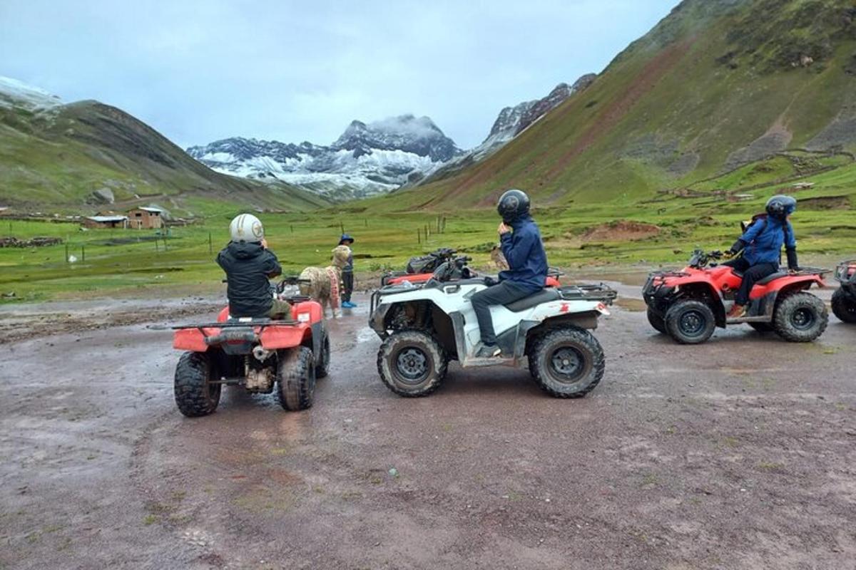 a group of people riding on atvs and a group of people