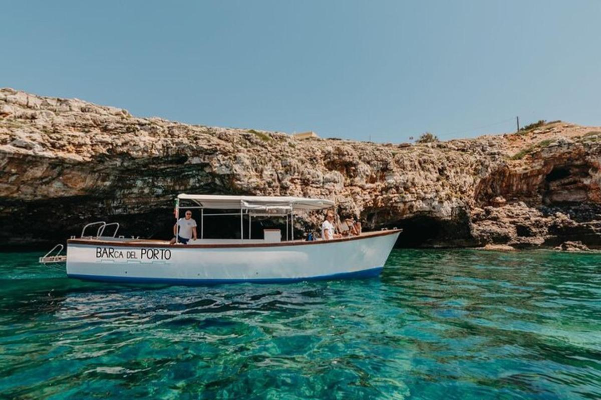 a group of people on a boat in the water