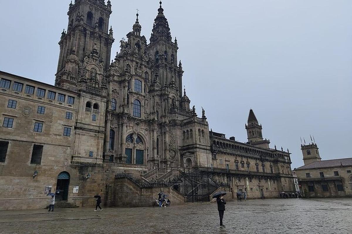 a person standing in front of a large building
