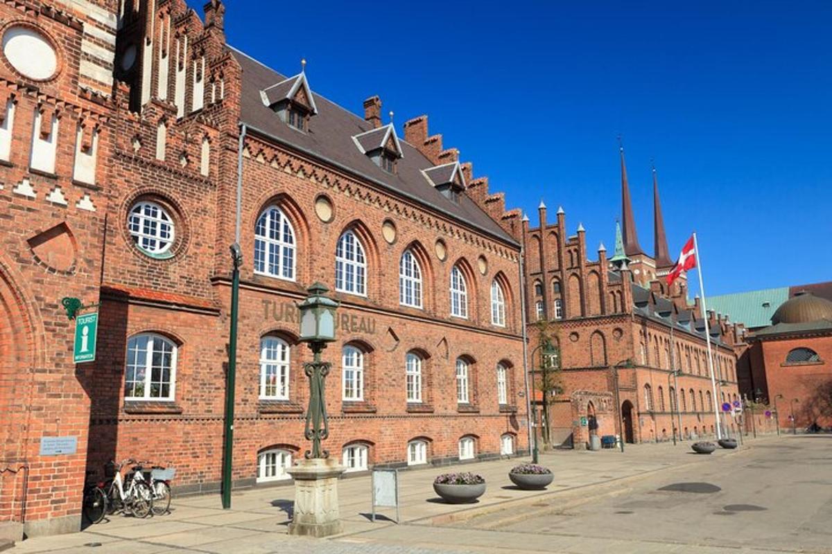 a large brick building with a street light in front of it
