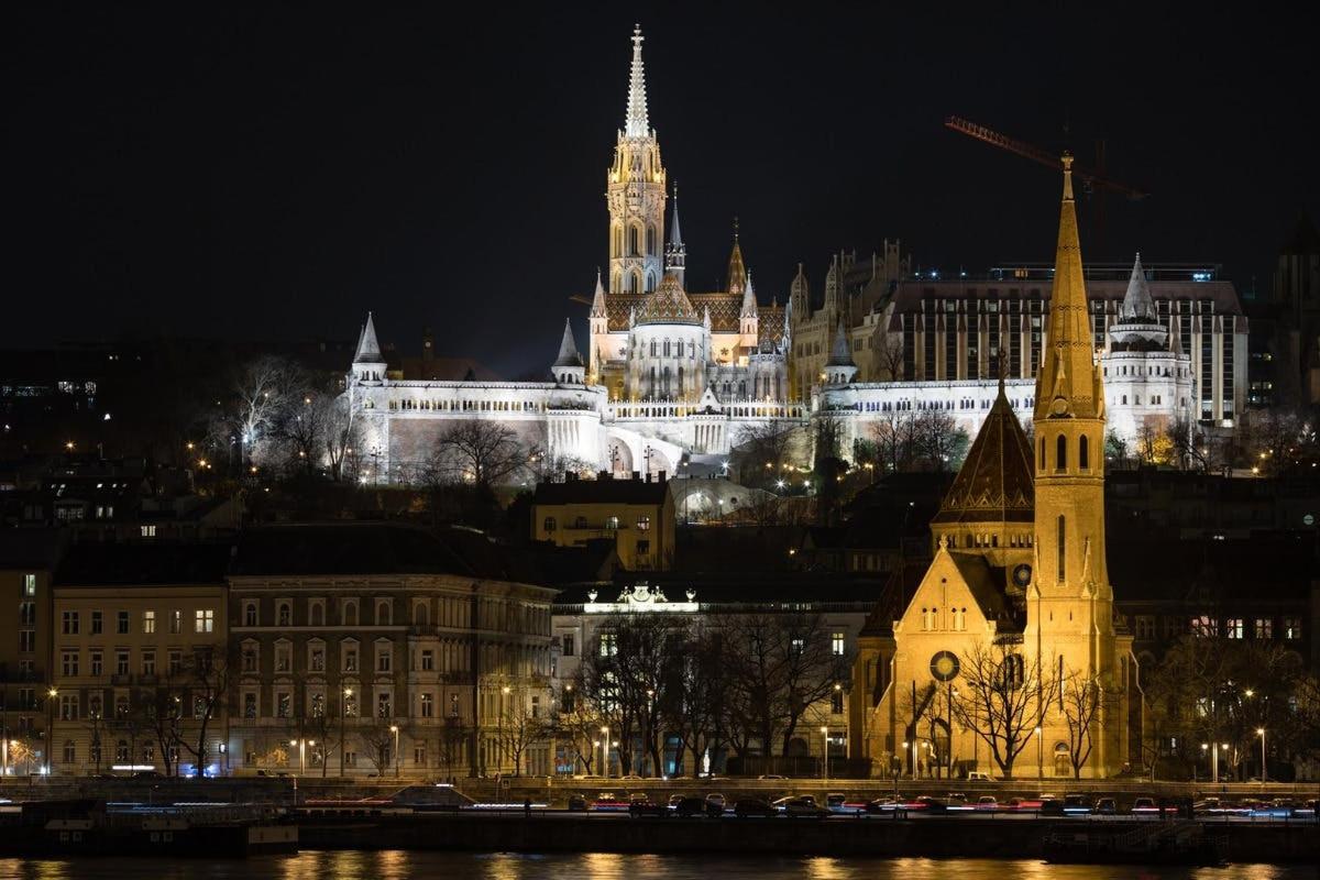 a view of a city at night with a building