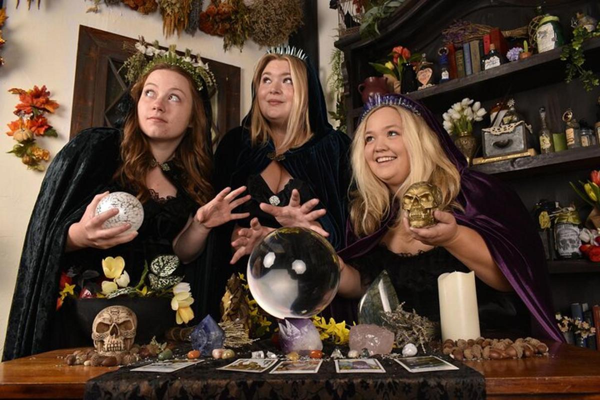 three girls are posing for a picture in a room full ofooky items