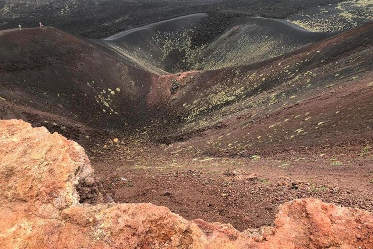 a view of a mountain with rocks and dirt