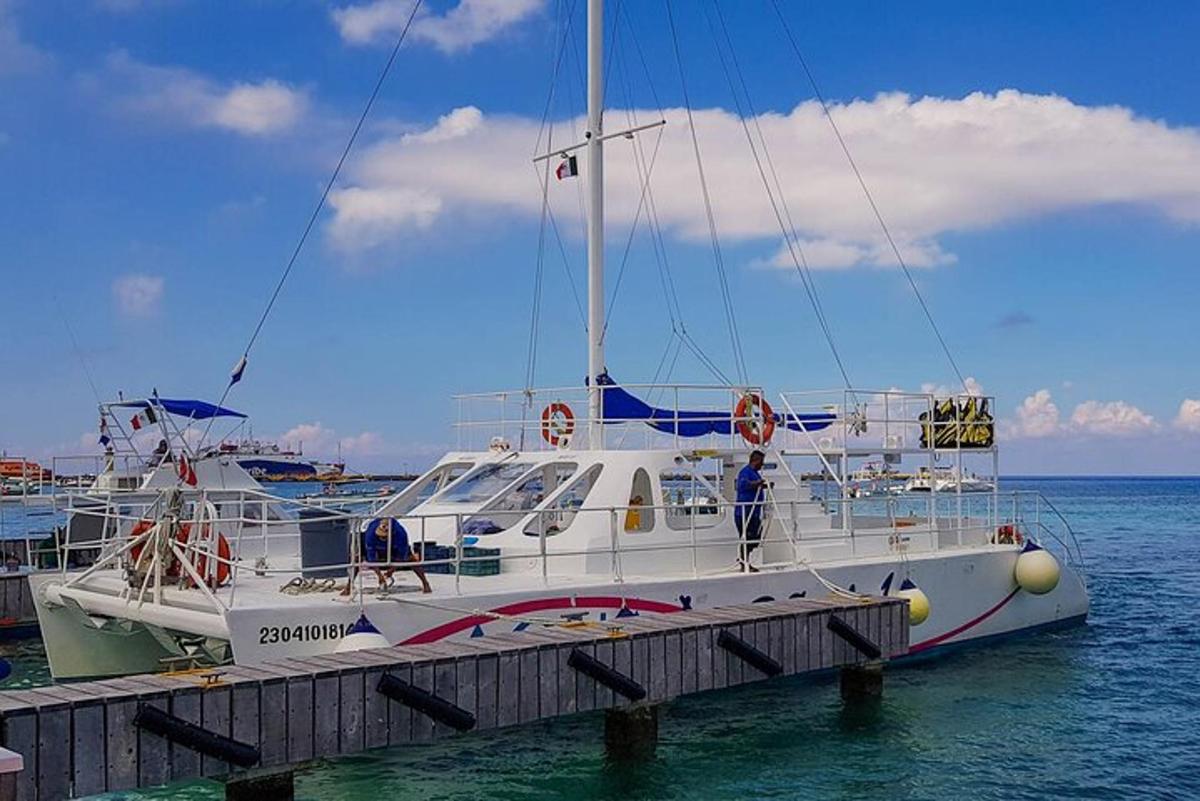 a boat is docked at a dock in the water