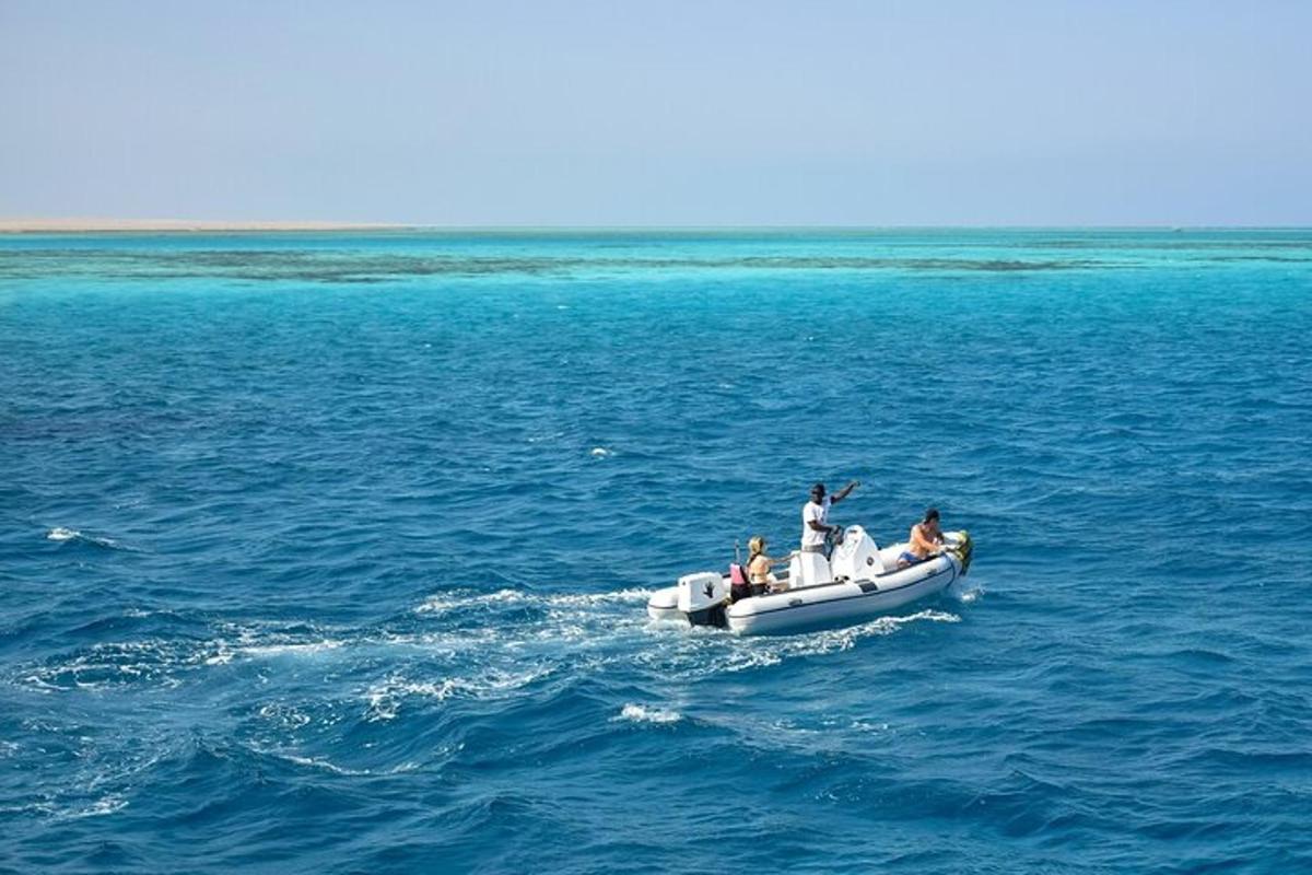 a group of people on a boat in the water