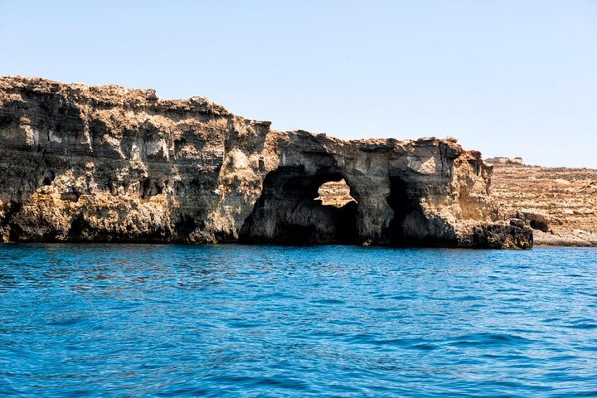 a large cave in the middle of the water