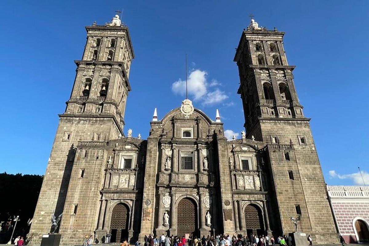 a large building with two towers on top of it