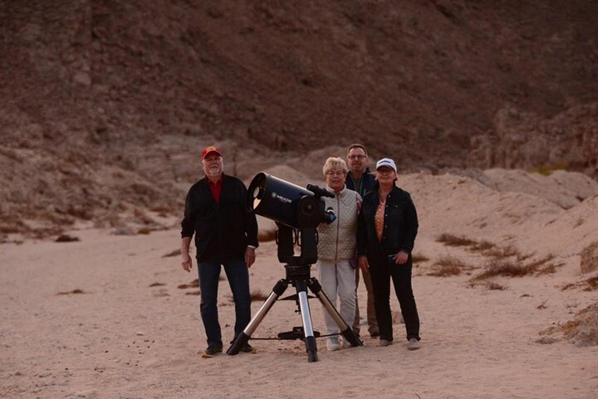 a group of people standing in front of a camera