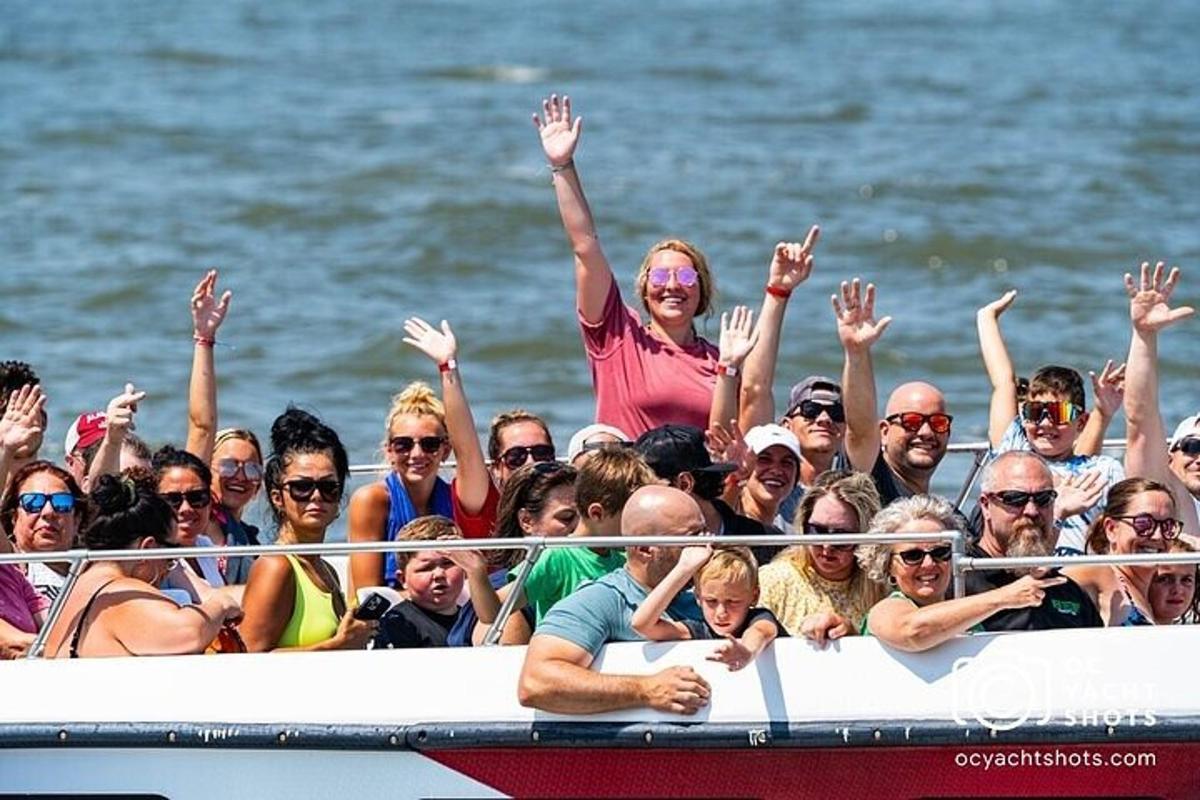 a group of people on a boat in the water