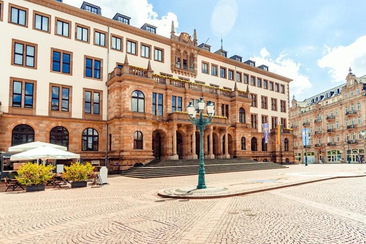 a large building with a statue in front of it