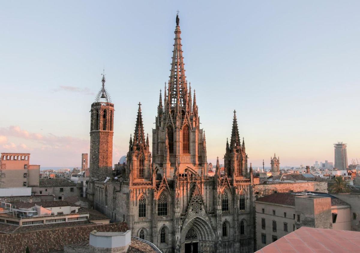 an old cathedral with turrets and spires in a city