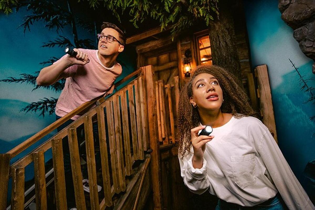 a man and a woman standing on a balcony