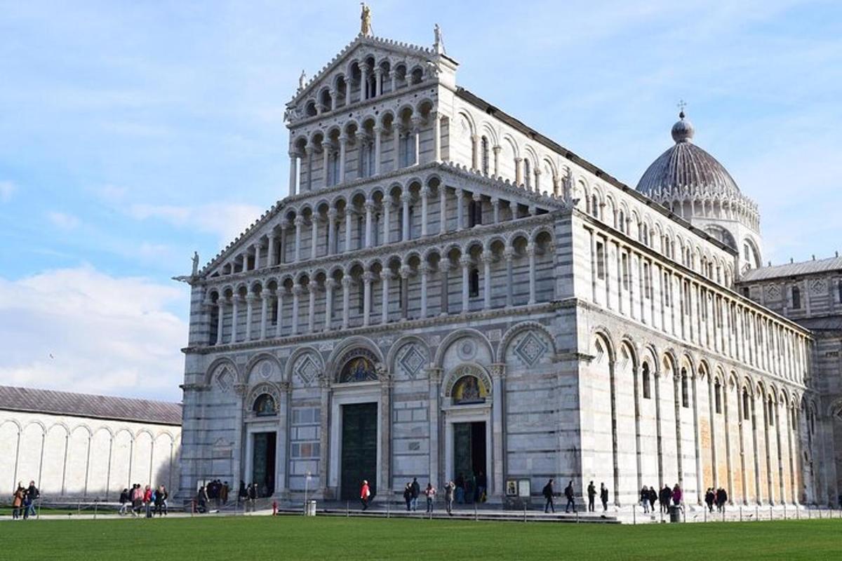 a large white building with a dome on top of it