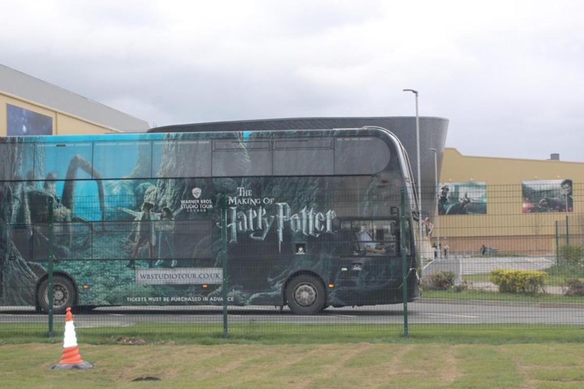 a double decker bus parked in front of a building
