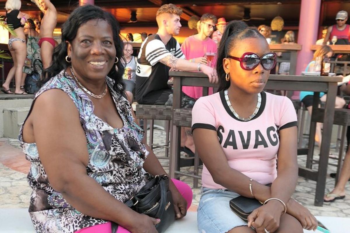 two women sitting next to each other