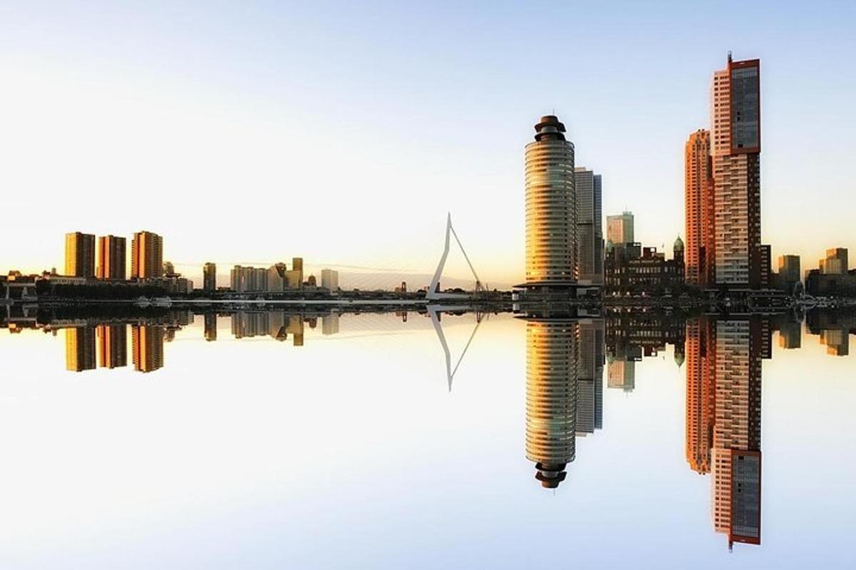 a city skyline with buildings and a body of water