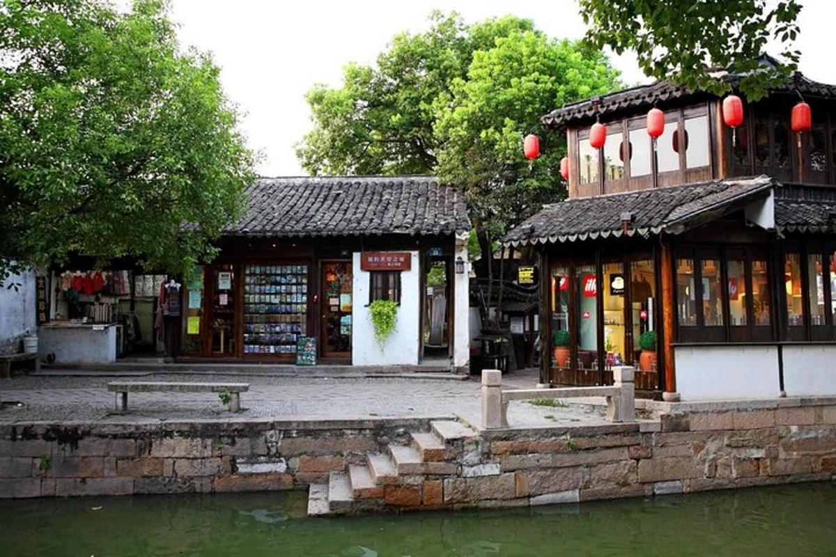 a building next to a body of water