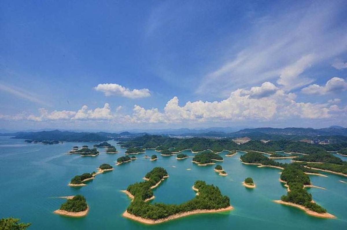 an aerial view of a group of islands in the water