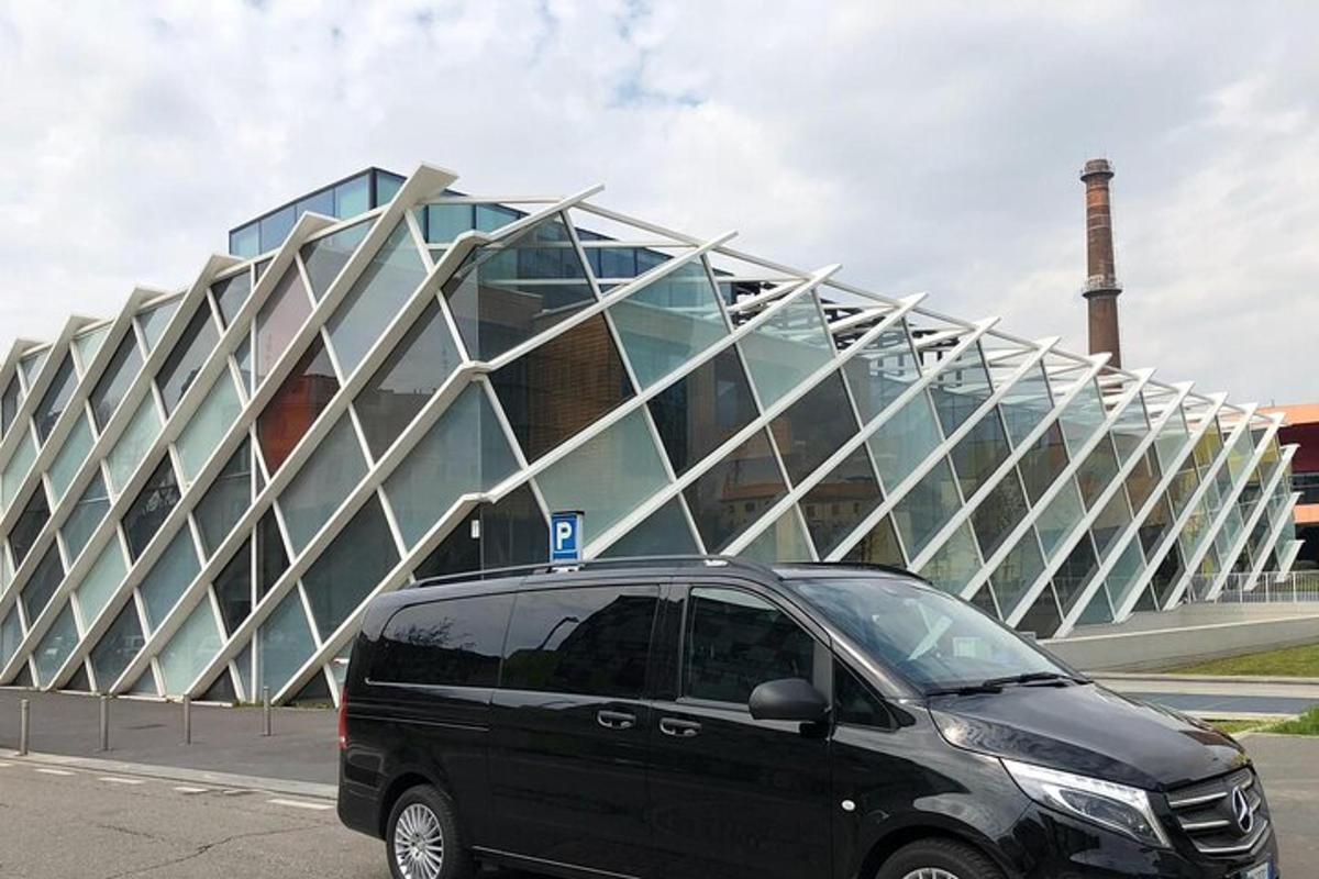 a black van parked in front of a building