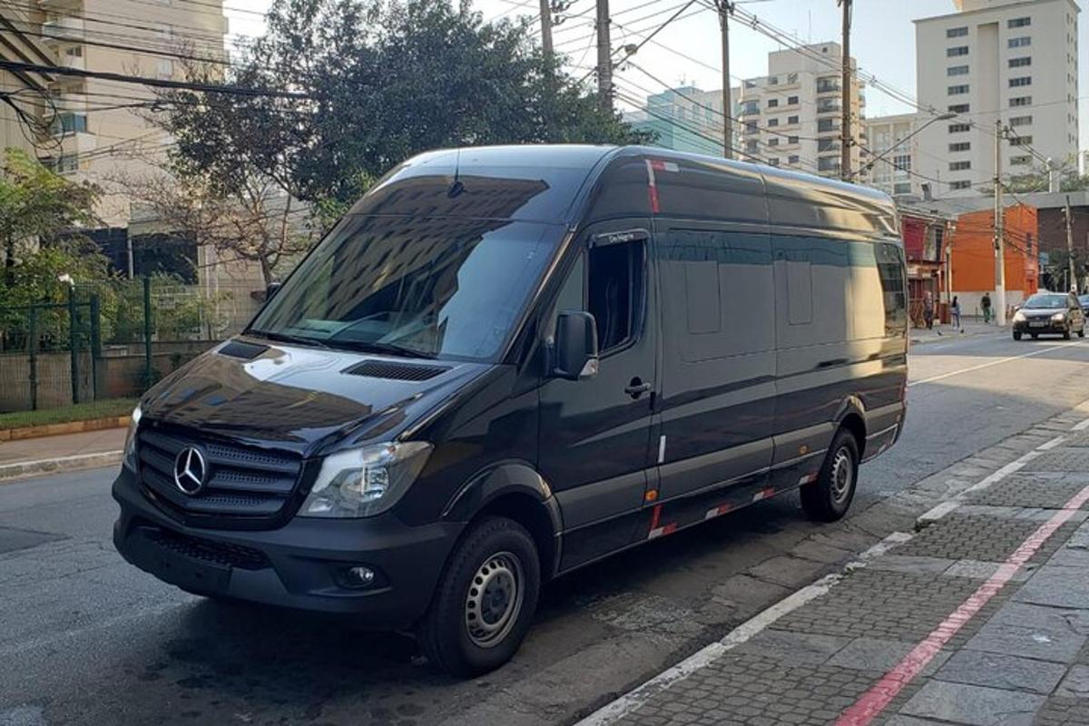 a black van parked on the side of a street
