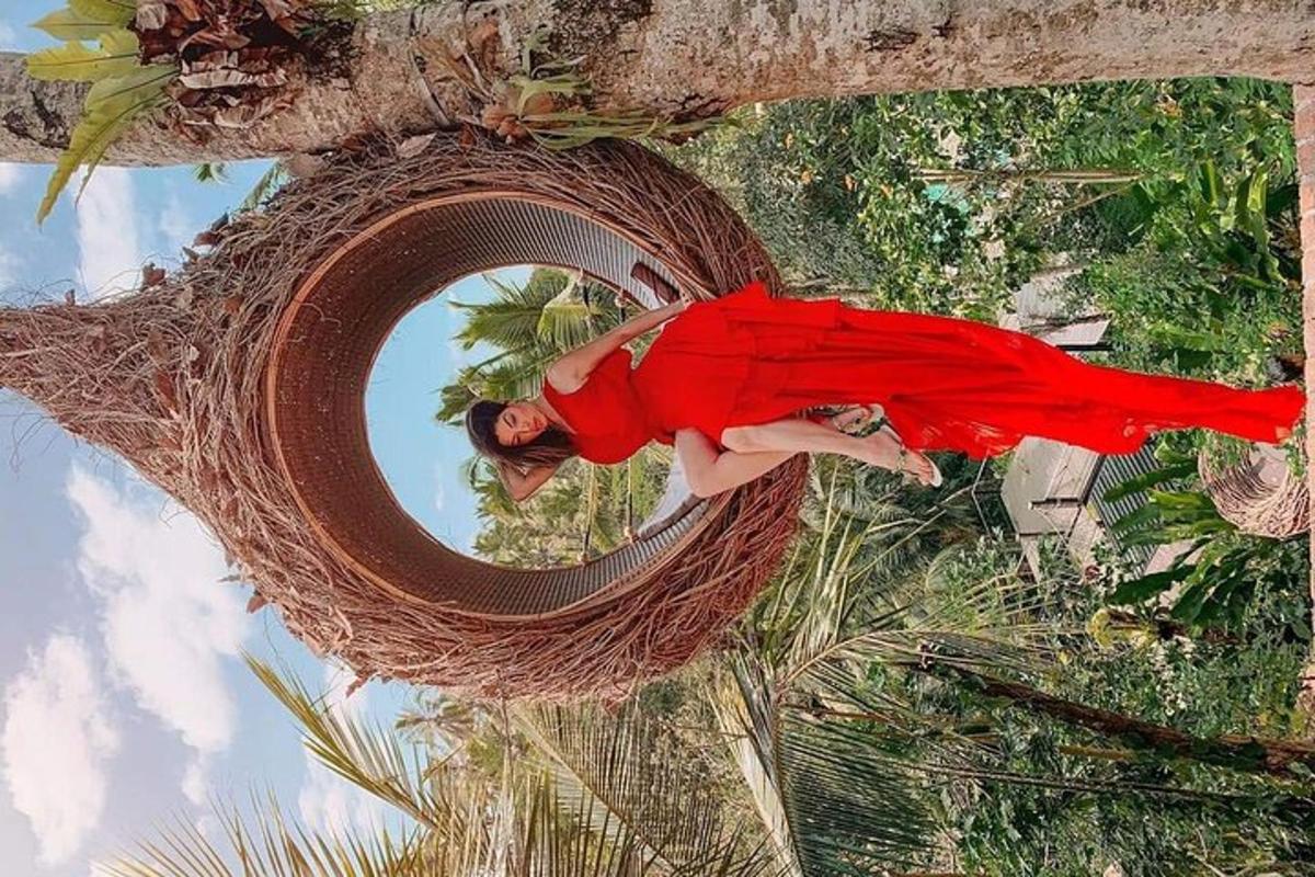 a woman in a red dress is sitting in a wreathedigunigunigun