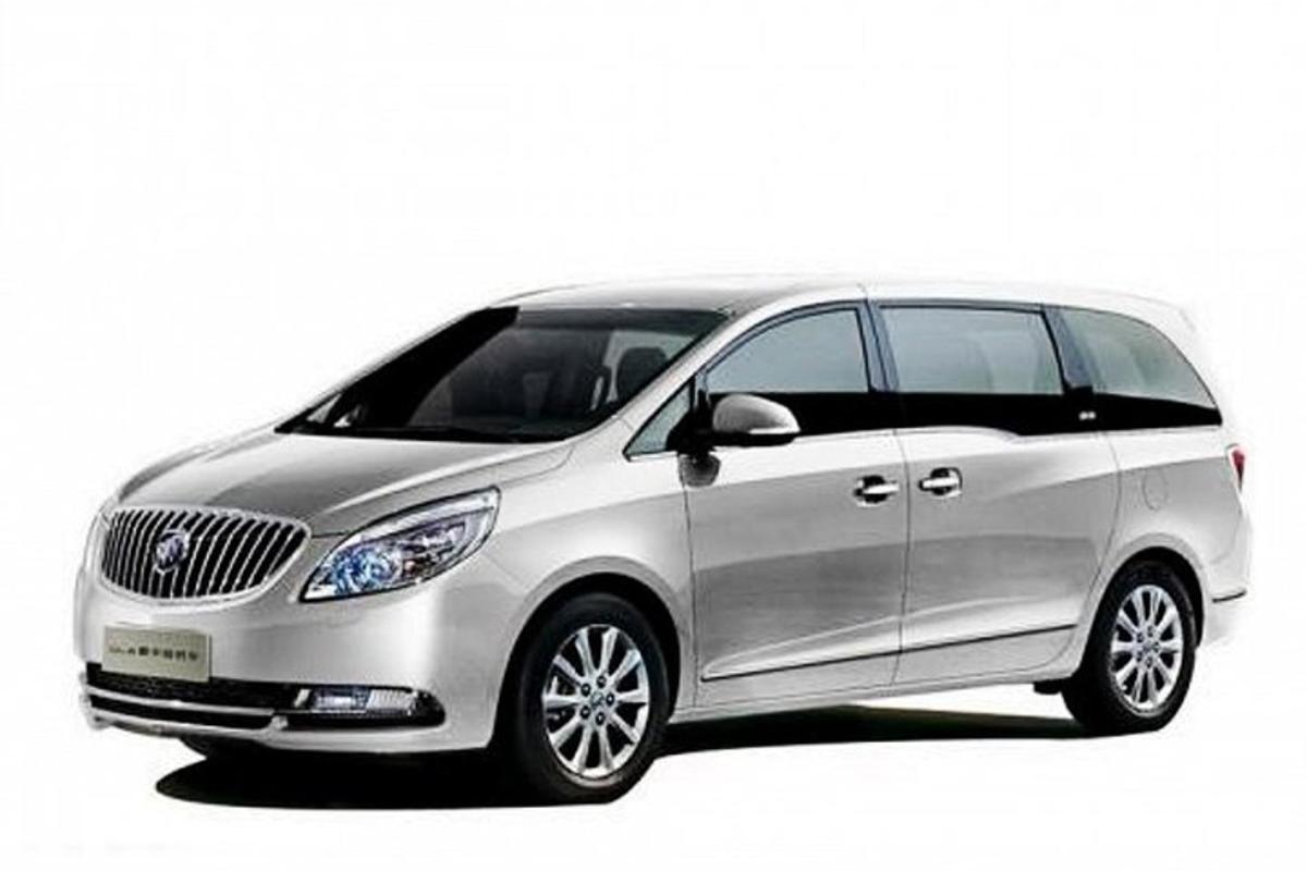 a silver car is parked on a white background